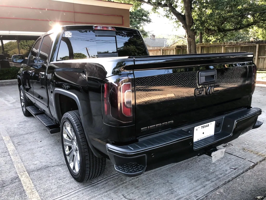 Truck Wraps San Antonio | Custom Vinyl Wraps & Installation 2 Black GMC featuring custom truck wraps by SATXwraps