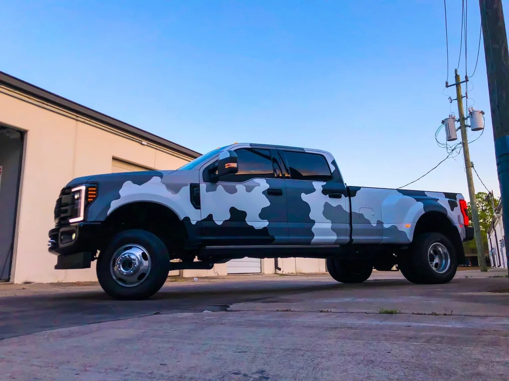 Truck Wraps San Antonio | Custom Vinyl Wraps & Installation 3 Ford F-150 featuring a custom camo truck wrap by SATXwraps in San Antonio