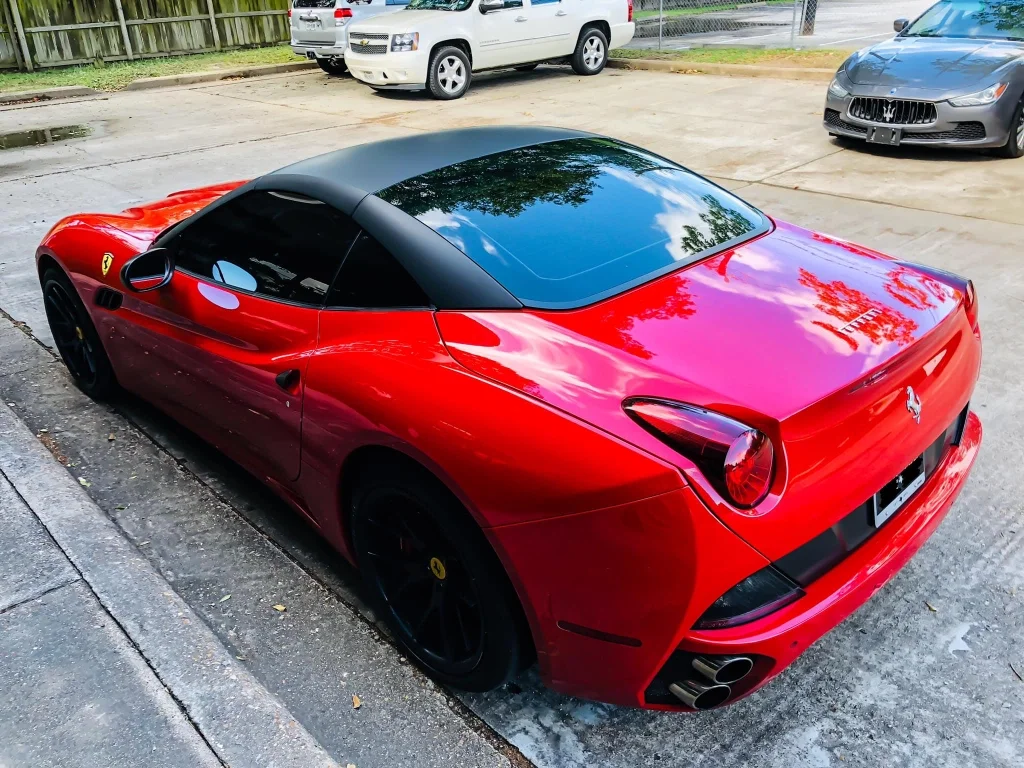 Red Ferrari California showcasing a premium car wrap by SATXwraps in San Antonio TX
